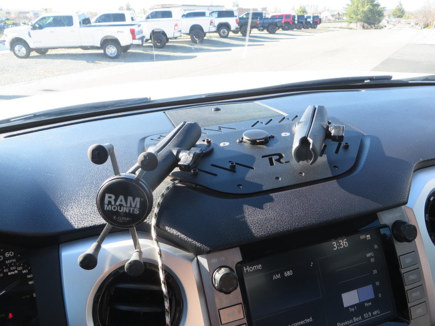 2020 White /GREY Toyota Tundra SR5 (5TFDY5F19LX) with an 5.7L engine, automatic transmission, located at 2630 Grass Valley Highway, Auburn, CA, 95603, (530) 508-5100, 38.937893, -121.095482 - Features - King Off Road adjustable remote reservoir coil overs, King 2.5 adjustable remote reservoir rear shocks, Method Race wheels, Falken Wildpeak tires, Sliders, Bed braces, Borla Exhaust, Husky floor mats, Window tint, and Ram phone mounts. - Photo#25